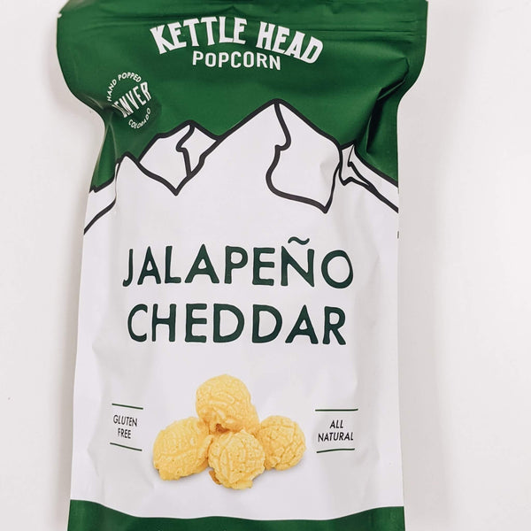 Spice up your popcorn!  Try the Jalapeño Cheddar Kettle Head popcorn at Curate Mercantile.